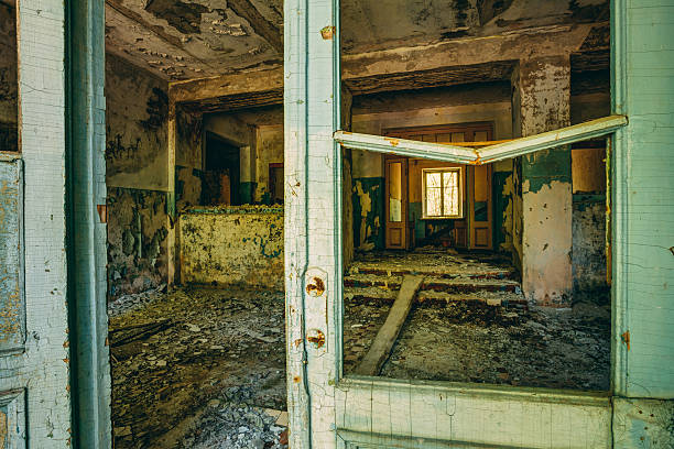 istock Dilapidated passage in school of Pripyat. Chernobyl Disaster 472061302