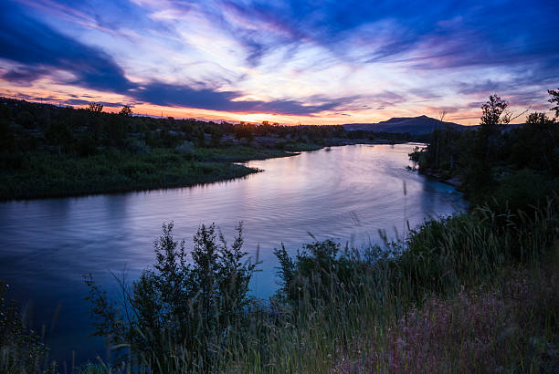 Boise River sunset Beautiful and dramatic sunset along Boise River in Boise, Idaho,USA boise river stock pictures, royalty-free photos & images