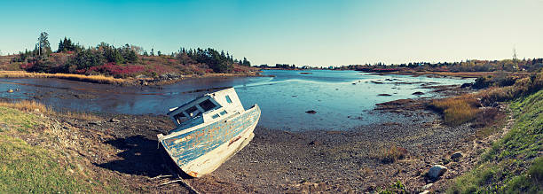 istock Old Boat on the beach in Nova Scotia 472061591