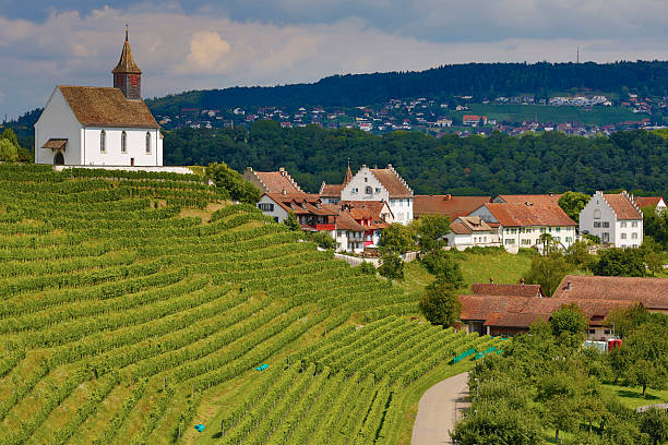 istock Chapel, vineyard and village 472063263