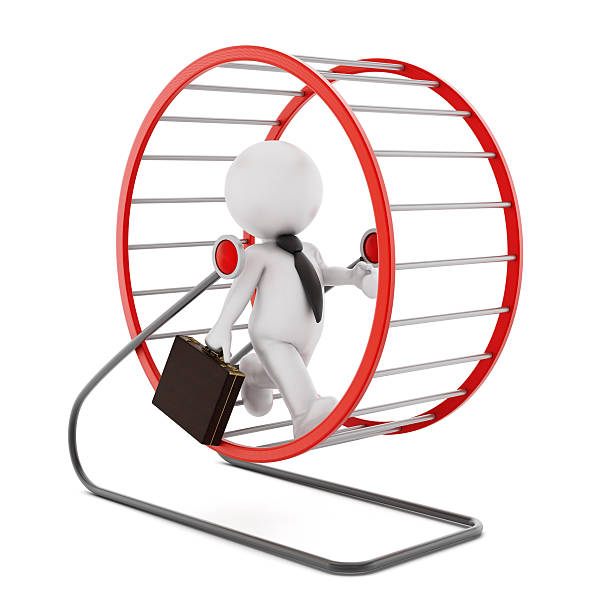 istock Businessman running in a hamster wheel 472063417