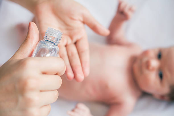 istock Mother makes massage for happy baby 472064122