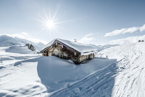 Snowcapped cottage in winter