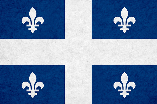 Quebec flag on mottled paper.