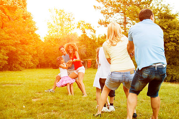 istock Families Playing Tug of war. 472064625