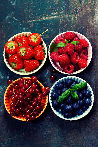 istock Fresh Berries on Wooden Background. Strawberries, Raspberries an 472067022