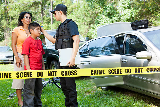 istock Policeman questioning witnesses during crime investigation. 472067597