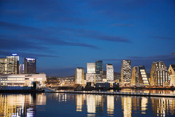istock Skyline of Oslo at night reflecting in water. 472067873