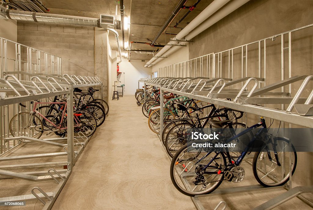 Bicycle Storage Secure bicycle storage in the basement of a parking garage. Bicycle Stock Photo