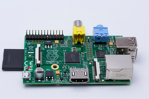 Haarlem, Netherlands - December 5, 2013: Raspberry Pi with inserted SD card. 