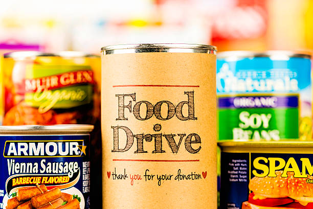 питание рекламная акция драйв - food canned food drive motivation стоковые фото и изображения