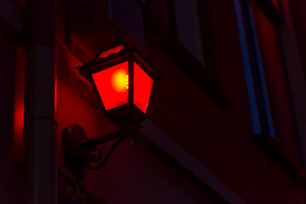 quartiere a luci rosse - prostitution night horizontal outdoors foto e immagini stock