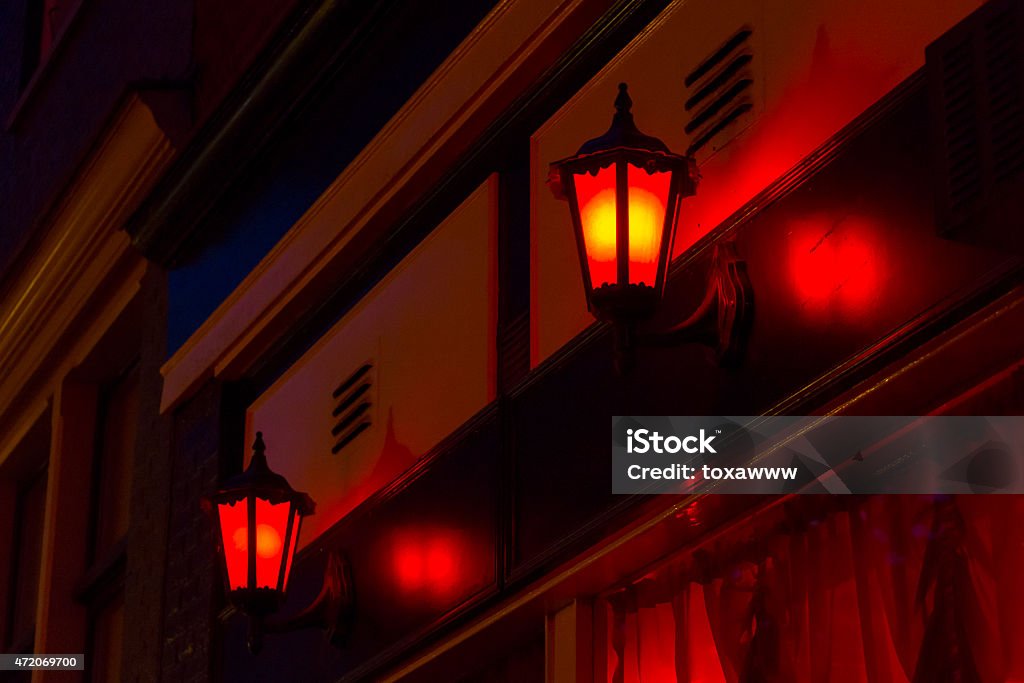 Red Light District Red lanterns on the wall in Red Light District in Amsterdam, Netherlands 2015 Stock Photo