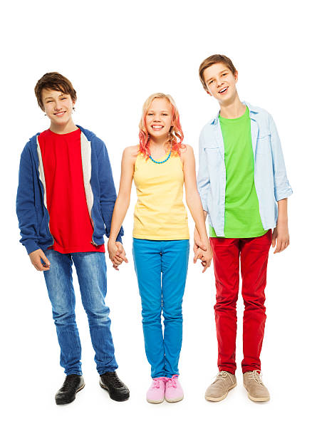 istock Nice young teens boys and girl hold hands 472070540