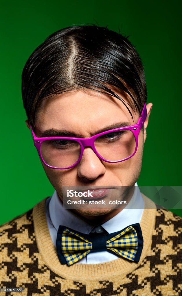 sad nerd funny nerd with purple horn rimmed eyeglasses being sad. 20-29 Years Stock Photo