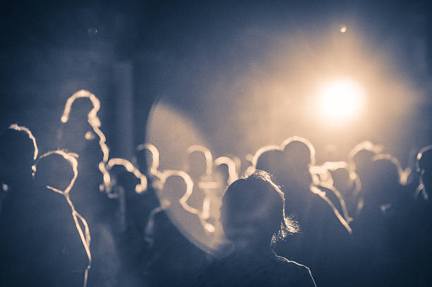 istock crowd at a concert in a vintage light noise added 472071170