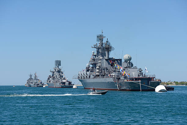 Sevastopol, Crimea, Ukraine - May 8, 2013: Russian and Ukrainian warships anchored in the bay of Sevastopol. Ships prepare to the naval parade in honor of 230th anniversary of Black Sea Navy of Russia