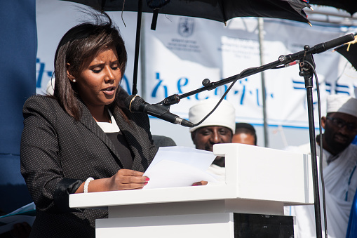 Jerusalem, Israel - October 31, 2013:  Pnina Tamano-Shata, Member of the Knesset speaks at the Sigd Celebration in Jerusalem, Israel. The Sigd is an annual holiday of the Ethiopian Jews.