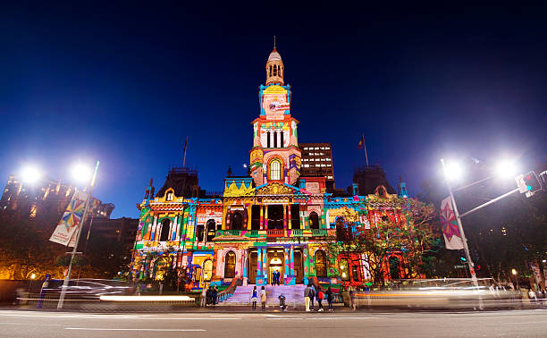Sydney, Australia - December 6, 2013: A colourful Christmas design is projected on the facade of Sydney Town Hall on George Street at night.