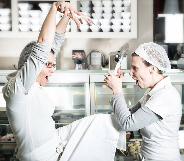 istock Ice Cream Vendors Fighting Each Other 472075733