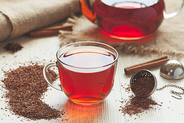 Traditional organic rooibos tea in rustic style with faded instagram stock photo