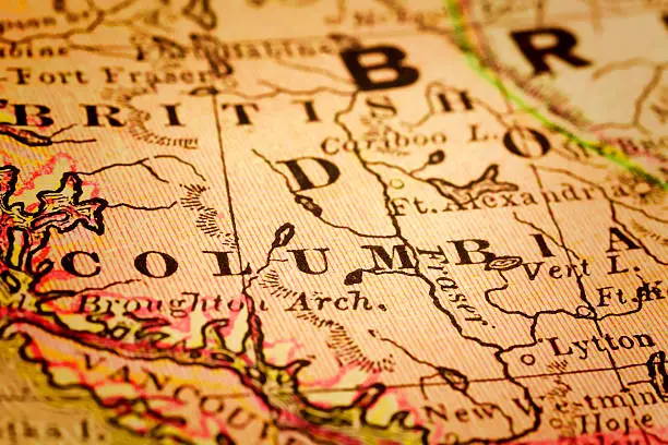 British Columbia on a 1880's map. British Columbia is a province located on the west coast of Canada. British Columbia is also a component of the Pacific Northwest, along with the U.S. states of Oregon and Washington. Selective focus and Canon EOS 5D Mark II with MP-E 65mm macro lens.
