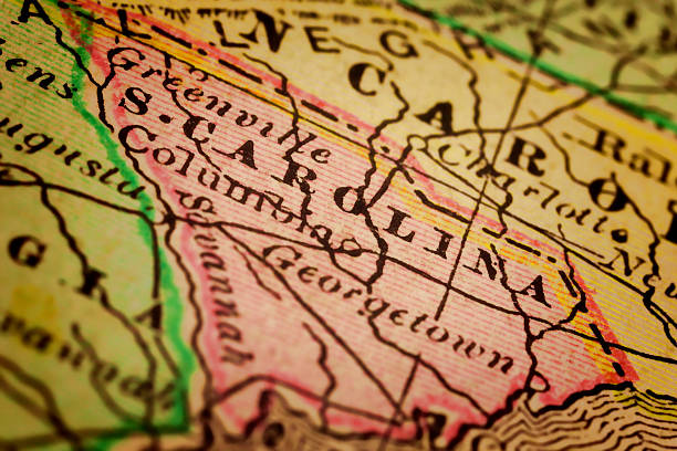 South Carolina State on an Antique map South Carolina on a 1880's map. South Carolina is a state in the Southeastern United States. It is bordered to the north by North Carolina; to the south and west by Georgia, located across the Savannah River; and to the east by the Atlantic Ocean. Selective focus and Canon EOS 5D Mark II with MP-E 65mm macro lens. kiawah island stock pictures, royalty-free photos & images