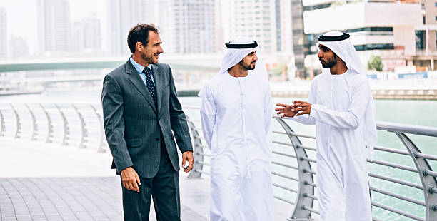 istock Emirati having outdoors business meeting 472076448