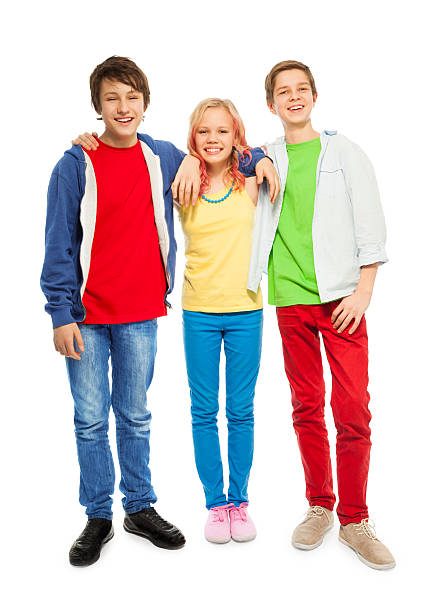 istock Three cute teens stand with hands on shoulders 472076650