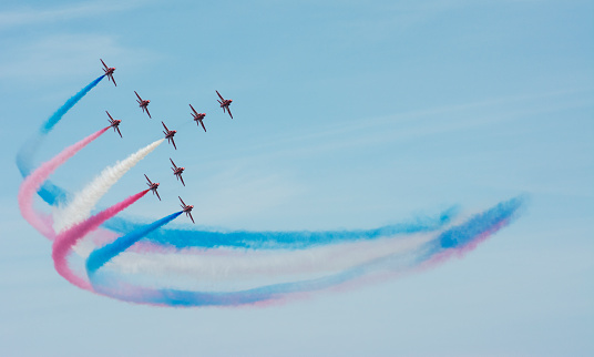 Sunderland, UK - July 27th 2013: The RAF Red Arrows fly in formation at the Sunderland airshow 2013.