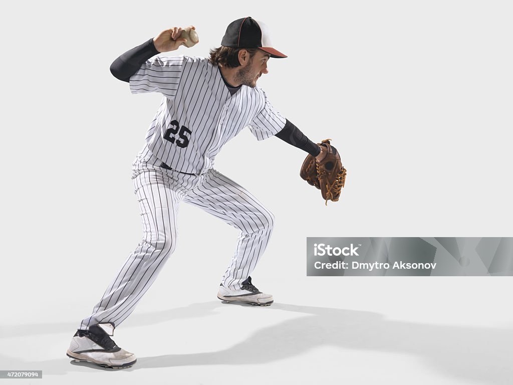 Baseball player isolated on white Baseball Player Stock Photo