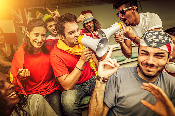 istock Group of different nations supporters together 472080127