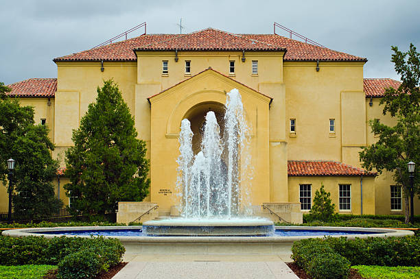 Memorial Auditorium on Stanford University campus Stanford, United States - October 10, 2011: A fountain in a courtyard is seen during the daytime on the campus of Stanford University in front of Memorial Auditorium. The university was originally established in 1891 and has over 15,000 students.  stanford university photos stock pictures, royalty-free photos & images