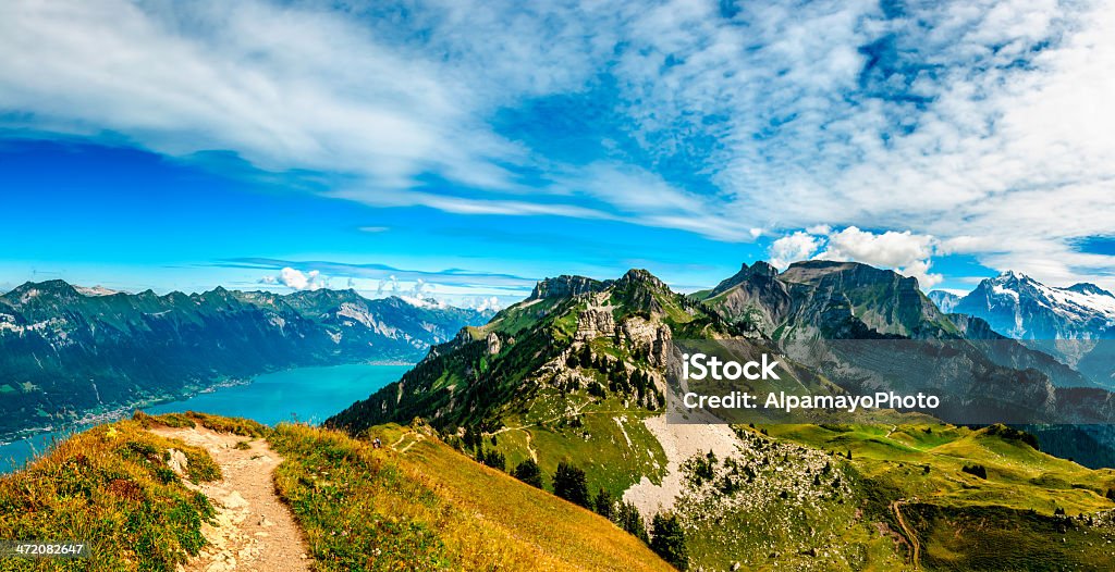 Mountains above Interlaken and Brienze lakes - III Interlaken is a town and municipality in the Interlaken-Oberhasli administrative district in the Swiss canton of Bern. It is an important and well-known tourist destination in the Bernese Oberland region of the Swiss Alps, and the main transport gateway to the mountains and lakes of that region. The town is located on the Bödeli, between Lake Thun and Lake Brienz, and alongside the Aar river that flows between the two lakes. Interlaken - Switzerland Stock Photo