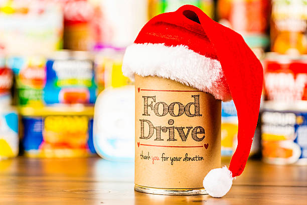 питание рекламная акция драйв - food canned food drive motivation стоковые фото и изображения