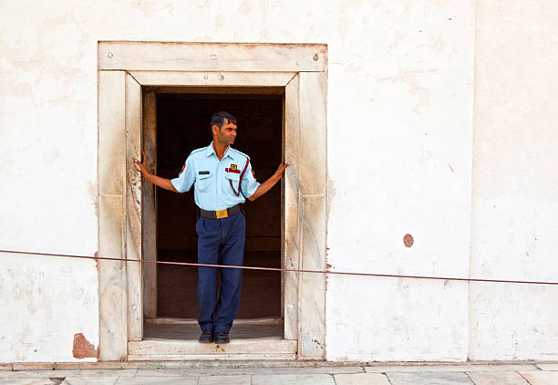 Delhi, India - November 9, 2011: guard pays attention at hall of Private Audience or Diwan I Khas at the Lal Qila  in Delhi, India.