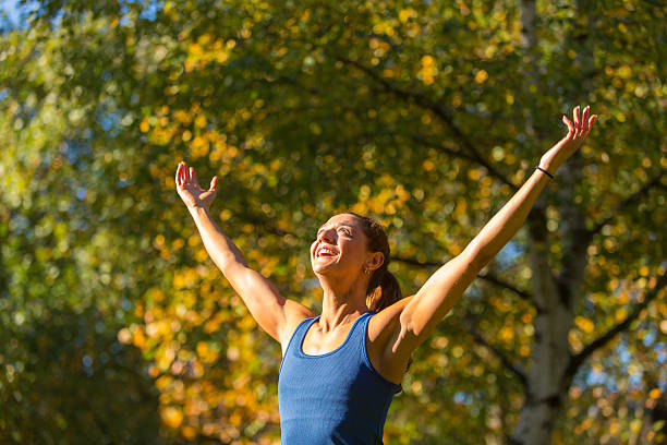 istock Woman With Arms Up 472084733