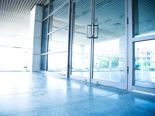 modern office building glass door of the office building. bank entrance stock pictures, royalty-free photos & images