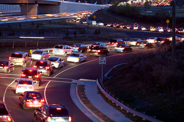 Traffic freeway ramp Bumper to Bumper in rush hour car traffic on a beltway ramp in Tysons Corner in Fairfax County. fairfax virginia photos stock pictures, royalty-free photos & images