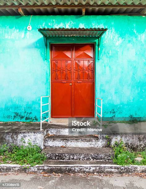 Red Door On Turquoise Stucco Home Stock Photo - Download Image Now - El Salvador, Building Entrance, Building Exterior