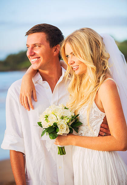 istock Bride and Groom, Enjoying Amazing Sunset 472087575