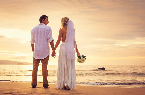 istock Bride and Groom, Enjoying Amazing Sunset 472087583