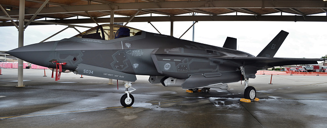 Panama City, USA - April 11, 2015: A U.S. Air Force F-35 Joint Strike Fighter (Lightning II) jet in a hanger at Tyndall Air Force Base. This F-35 is assigned to the 33rd Fighter Wing at Eglin Air Force Base. 