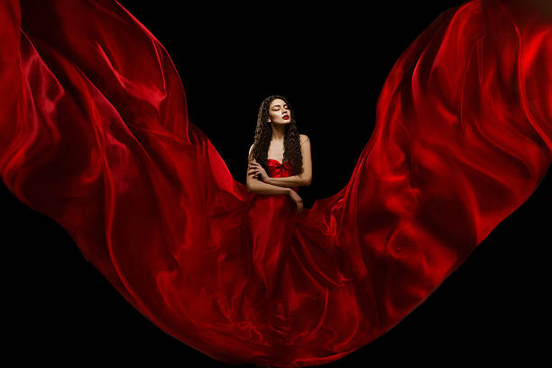 istock Beautiful girl in fabrics 472088298