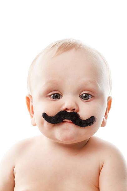 cute baby with moustaches stock photo