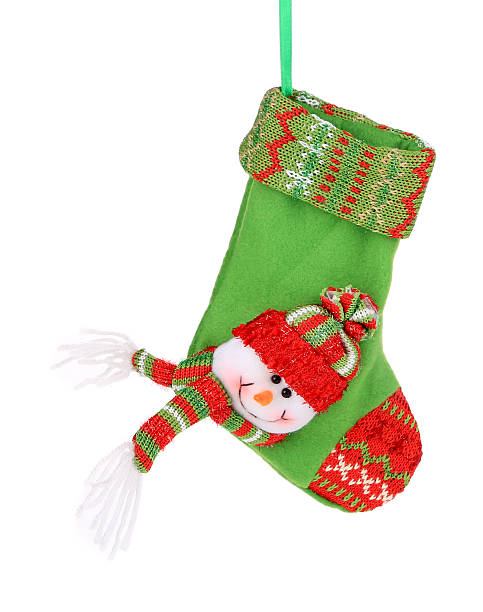 istock Christmas green sock with snowman. 472089643