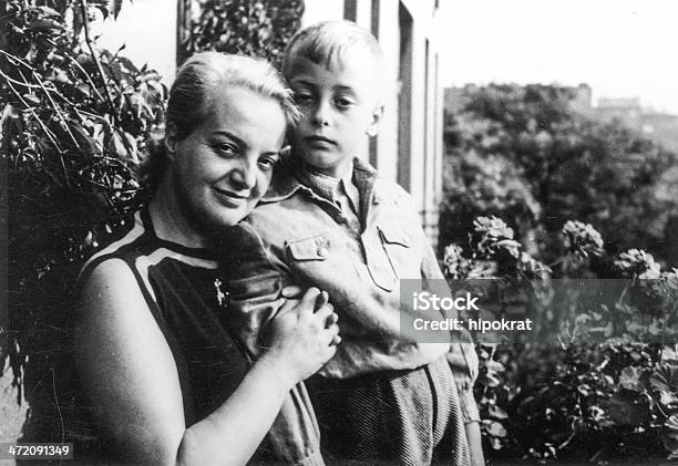 Old Black And White Photograph Of A Mother And A Son Stock Photo - Download Image Now