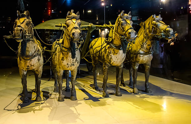 Ancient Chinese Horse and Carriage Statues stock photo