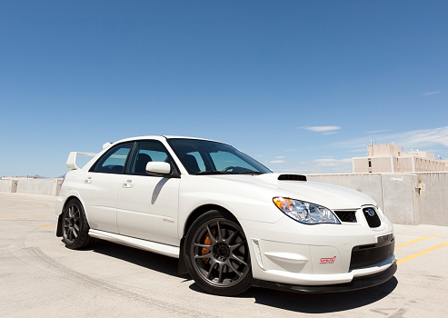 Scottsdale, United States - July 16, 2011: A photo of a parked Subaru WRX STI sedan. The WRX from Subaru is known for its Boxer engine and all wheel drive performance.