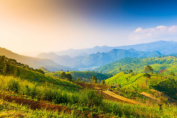 istock Beautiful sunshine at misty morning mountains . 472092439
